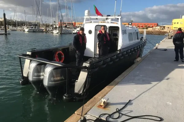 Tideman Marine HDPE hull work boat tied to dock cleats at a marina